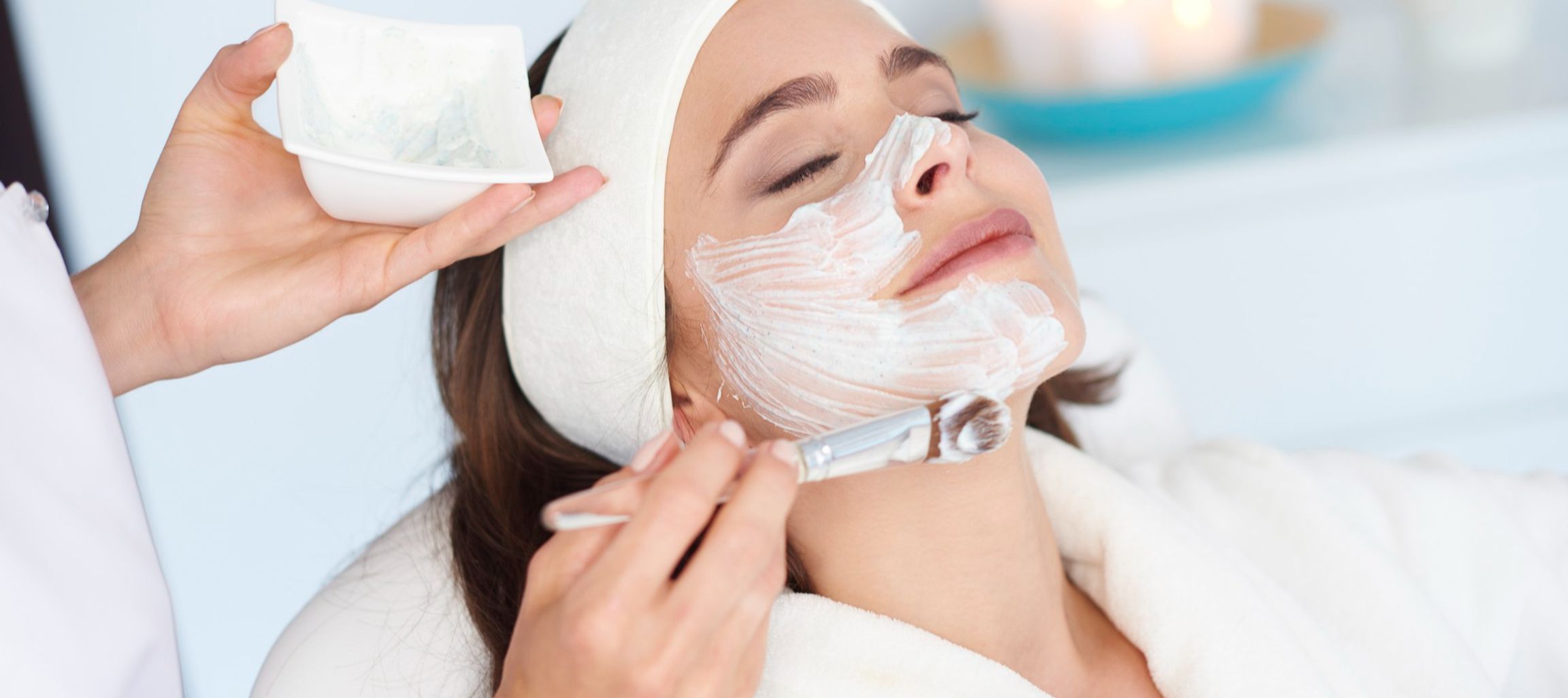 Lady getting skin care treatment on her face